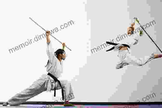 A Close Up Of A Martial Artist Performing A Complex Stick Fighting Technique. The Complete Big Stick Combat