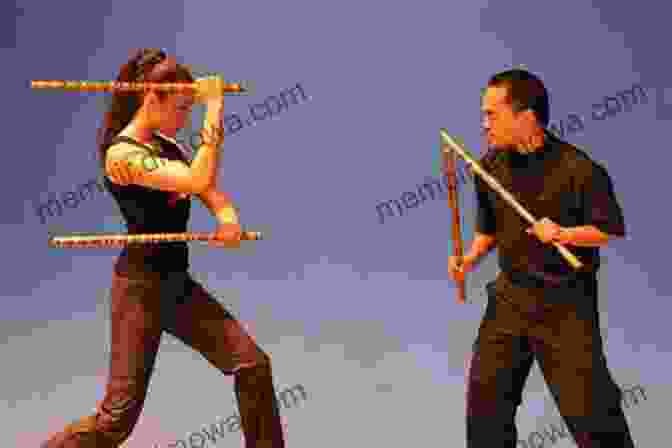 A Group Of Martial Artists Practicing Big Stick Combat In A Traditional Setting. The Complete Big Stick Combat