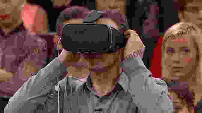 Dr. Phil Using A Virtual Reality Headset, Symbolizing His Embrace Of Innovation Dr Phil S Strategies For Success How Dr Phil Became Highly Successful And Achieved Celebrity Status Why Dr Phil Is A Highly Successful Talk Show Host And How To Successfully Change Your Life