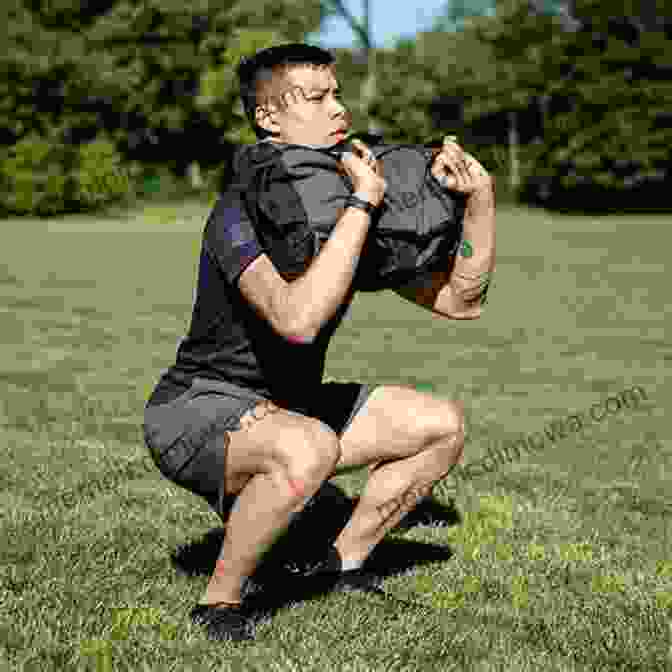 MMA Fighter Performing Sandbag Squats Sandbag Training For MMA Combat Sports